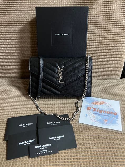 ysl woc silver or gold|YSL monogramed wallet.